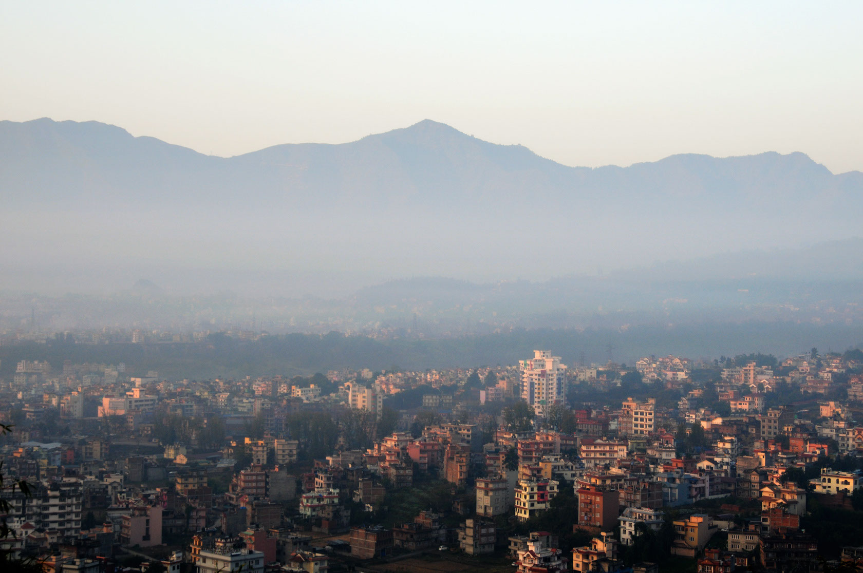 Sunrise over western Kathmandu seen from Harati Devi